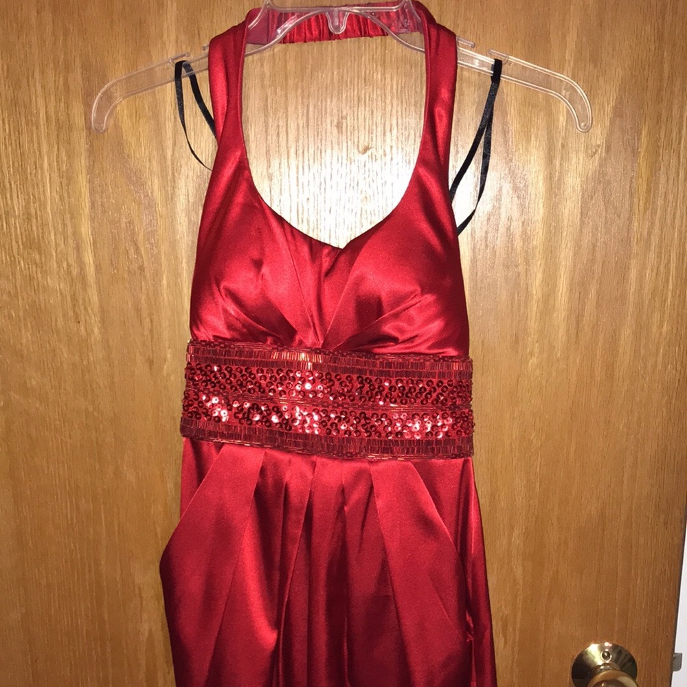This is a size 3/4 red formal dress from Windsor.